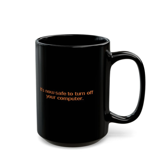 A black mug displays the message "It's now safe to turn off your computer" referencing Windows 95/98 nostalgia.