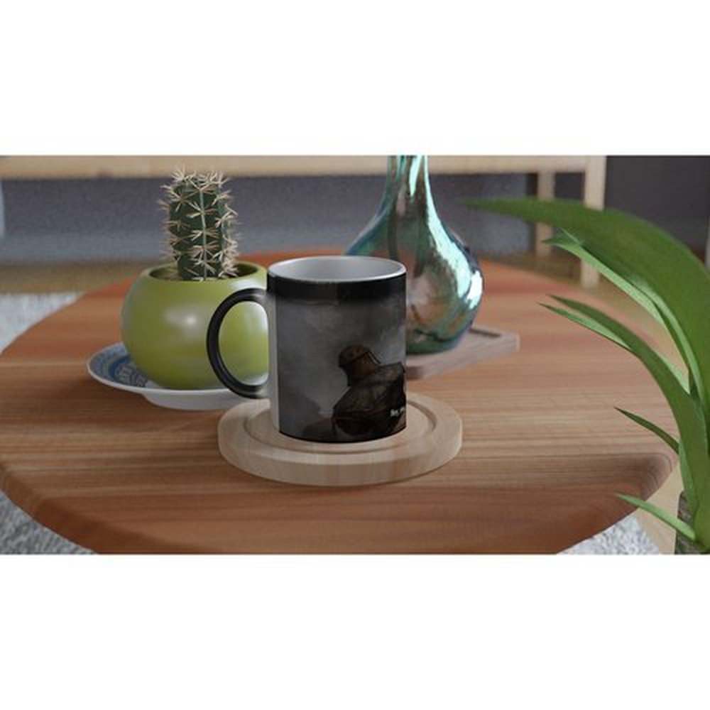 A black Skyrim mug featuring a character design sits on a wooden coaster next to a succulent and decorative vase on a round table.
