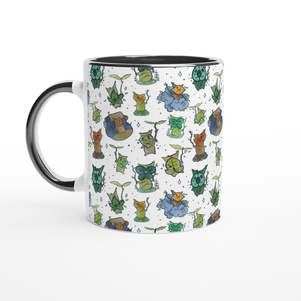 A white ceramic mug with a black handle and rim features an all-over pattern of Korok characters from The Legend of Zelda: Breath of the Wild and Tears of the Kingdom.