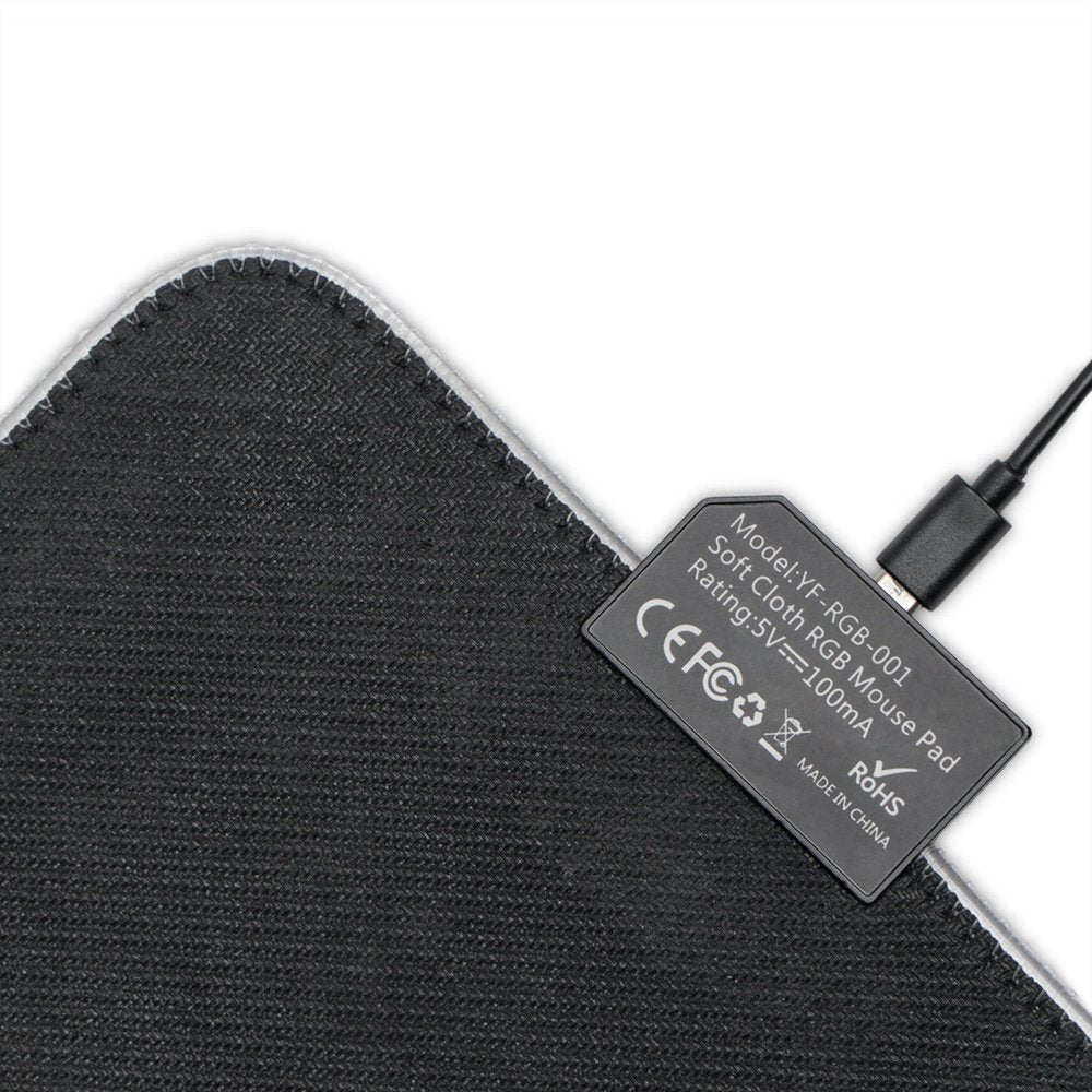 A black soft cloth LED gaming mouse pad featuring model information and certification logos on a white label.