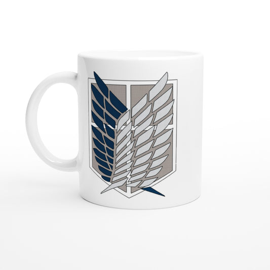 The white ceramic mug displays the Wings of Freedom emblem from Attack on Titan.