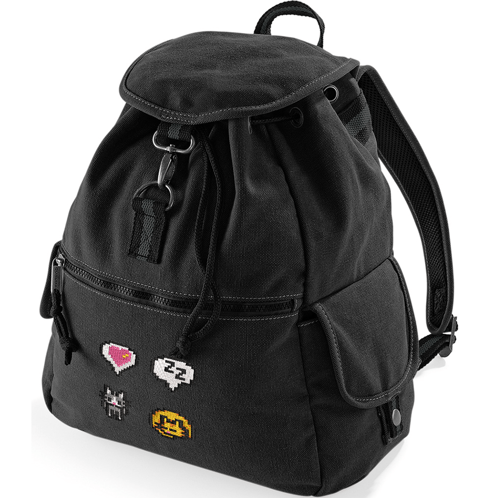 A black canvas backpack features pixelated designs of a cat, heart emote, and other icons referencing the Stardew Valley video game.