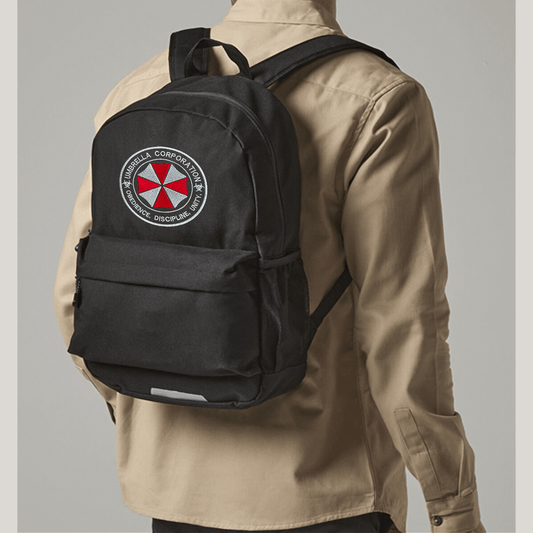 Person wearing a black backpack with Umbrella corporation logo on a gray background