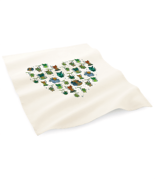 A white Legend of Zelda tea towel featuring a heart pattern made of small Korok characters.