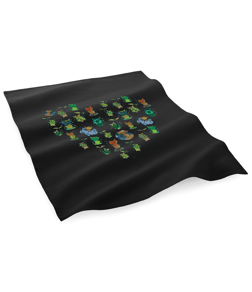 A black Legend of Zelda tea towel featuring a heart pattern made of various small Korok characters.