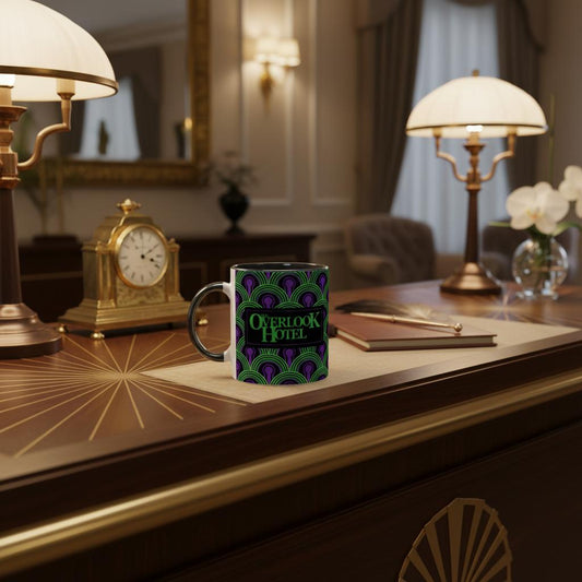 Mug with 'Overlook Hotel' wallpaper pattern from Room 237 design on a wooden desk with lamps and decor.