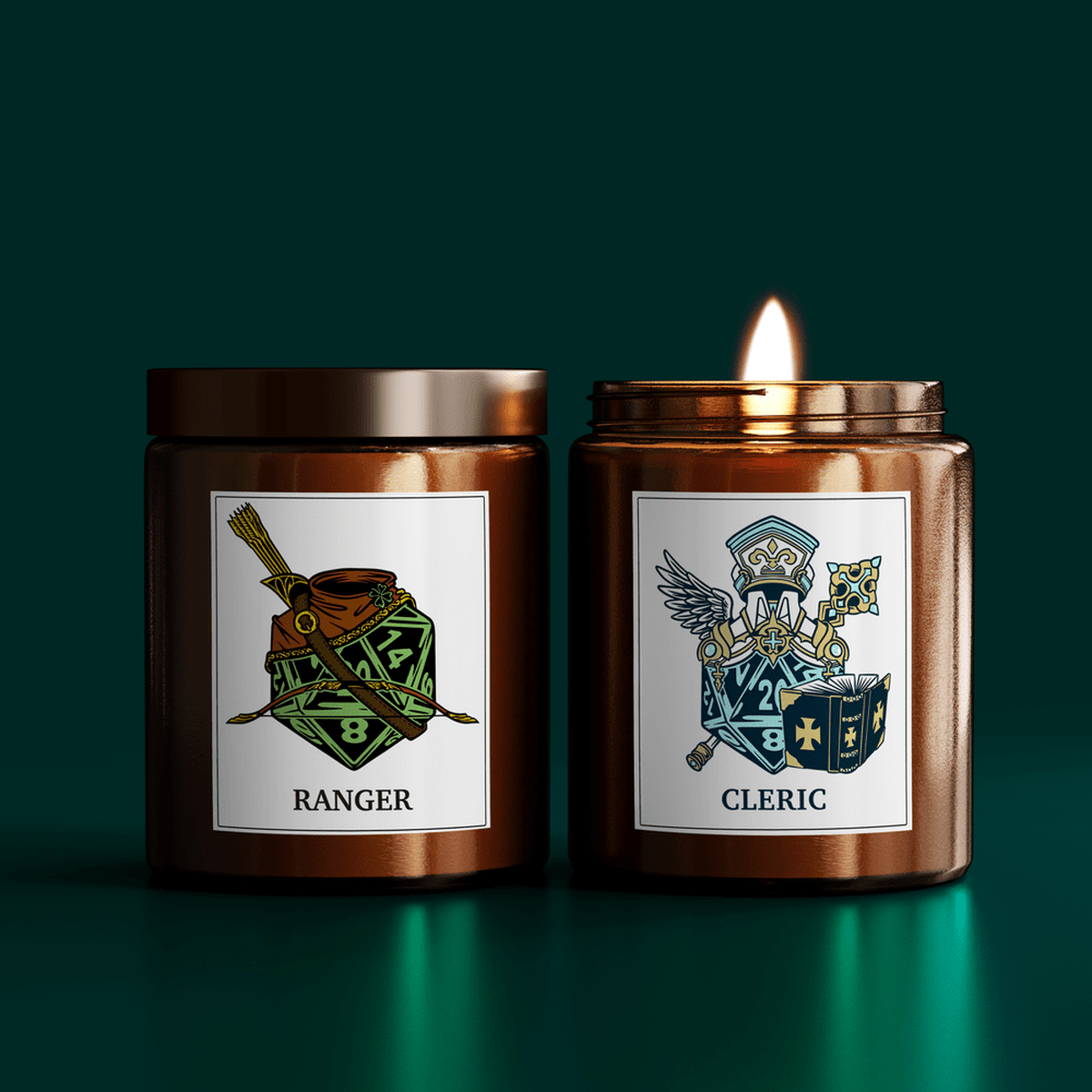Two DnD scented candles are displayed side-by-side, one labeled "Ranger" featuring an illustration of a bow and die, and the other labeled “Cleric” displaying a winged emblem and die.