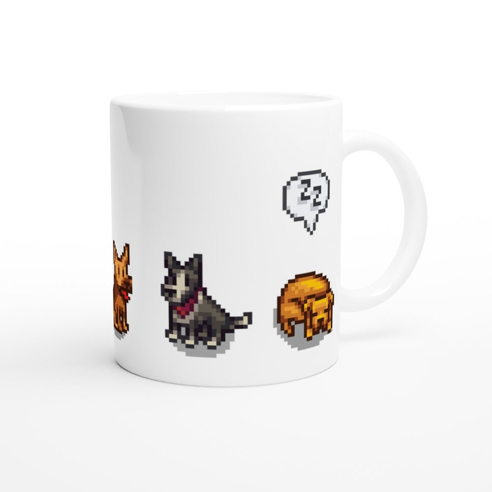 A white mug displays pixel art of three dogs from Stardew Valley, including one with a speech bubble containing a sleeping face emoticon.