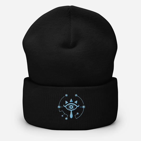 A black knitted beanie features an embroidered Sheikah eye design inspired by Tears of the Kingdom.