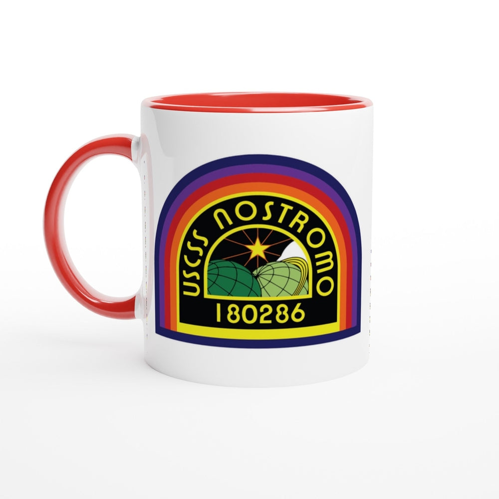 A white ceramic mug features a rainbow-colored logo displaying the USCSS Nostromo emblem and the number 180286, referencing the Alien movie universe.