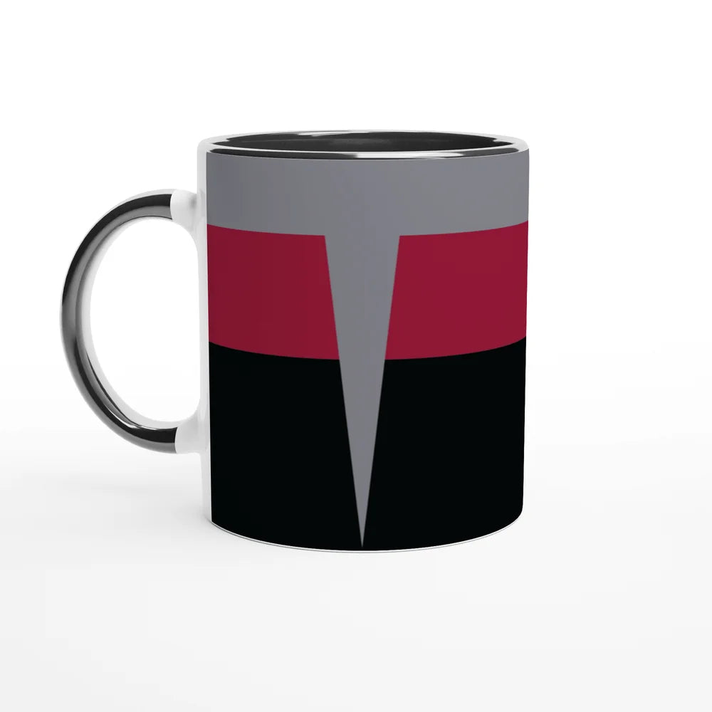 A white ceramic mug displays a design inspired by Star Trek DS9 uniforms featuring horizontal bands of gray, burgundy, and black.