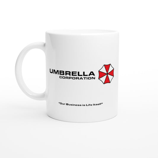 A white mug displays the Umbrella Corporation logo from Resident Evil along with the phrase "Our Business is Life Itself".