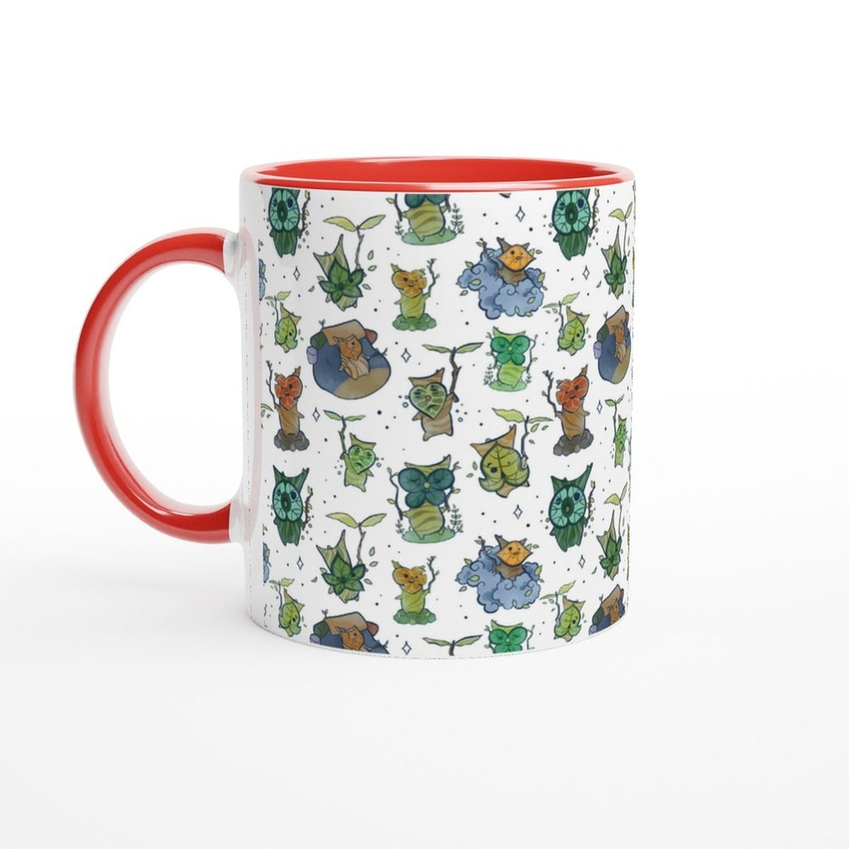A white ceramic mug with a red handle and rim features a repeating pattern of Korok characters from The Legend of Zelda: Breath of the Wild and Tears of the Kingdom.