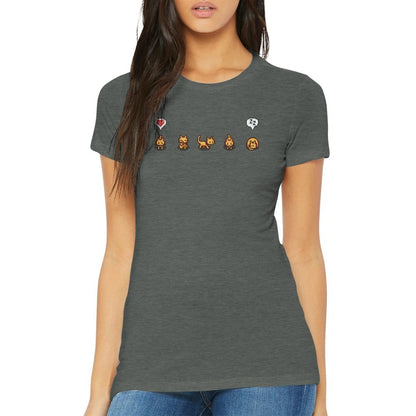 A woman wearing a dark gray Stardew Valley T-Shirt displays pixelated illustrations of ginger cats and emotes across the chest.