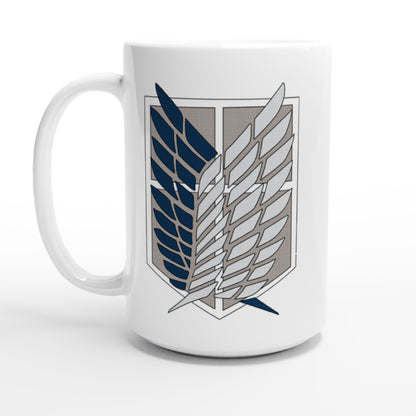 A white ceramic mug displays the Wings of Freedom emblem from Attack on Titan.