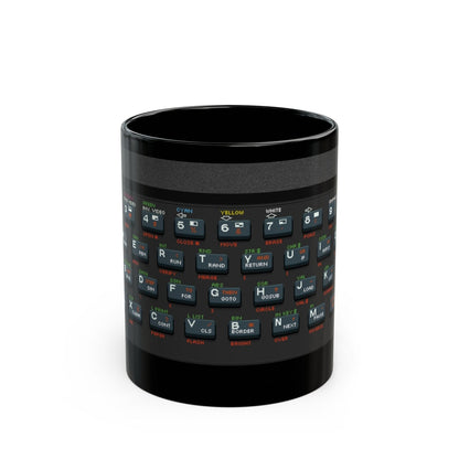 A black mug features pixel art graphics replicating a Retro Spectrum keyboard layout.