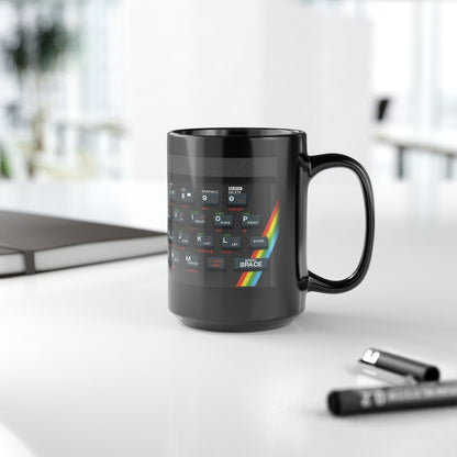 A black mug displays pixel art graphics of a Retro Spectrum keyboard layout with rainbow stripes at the bottom.