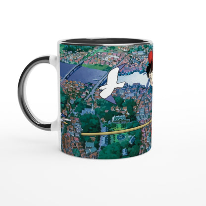 The mug depicts Kiki flying over Koriko with her cat Gigi, inspired by Studio Ghibli's "Kiki's Delivery Service.