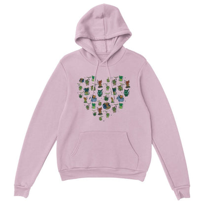 A pink hoodie displays a heart-shaped pattern of Korok characters from The Legend of Zelda: Tears of the Kingdom and Breath of the Wild.