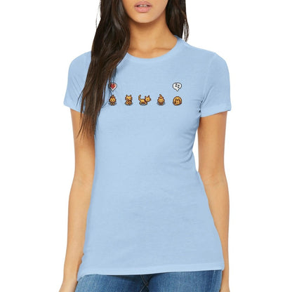 A woman wearing a light blue Stardew Valley T-Shirt displays illustrations of ginger cats and emotes across the chest.