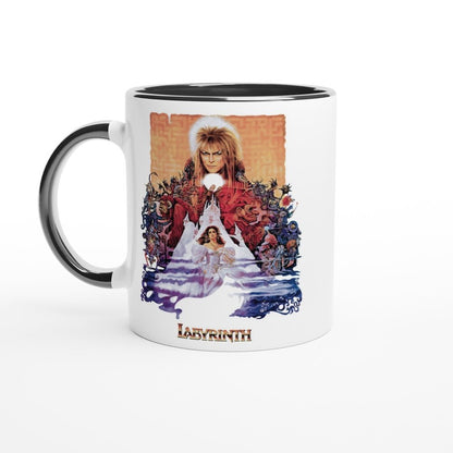 A white mug features a graphic from the 1986 fantasy movie Labyrinth depicting David Bowie as Jareth and Jennifer Connelly's character Sarah in front of a maze.