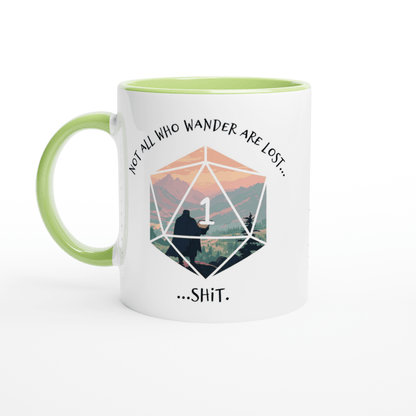 A white ceramic mug with a green handle and rim features a D20 die graphic displaying the number one and text referencing a D&D adventure.