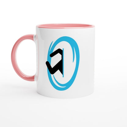 A white ceramic mug with a pink handle features a blue Portal symbol from the Half-Life video game.
