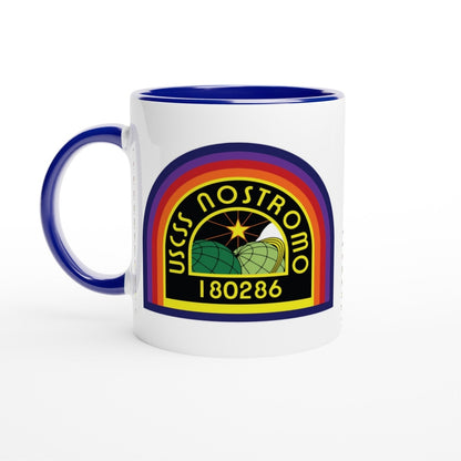 A white ceramic mug features a rainbow-colored logo for the USCSS Nostromo from the Alien movie universe.