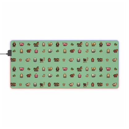 A rectangular LED gaming mouse pad features a green background patterned with pixelated images of animals from Stardew Valley.