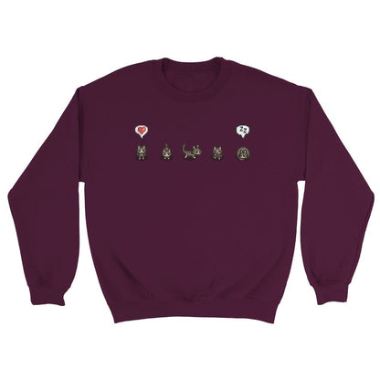 A grey Stardew Valley jumper displays a row of cat illustrations and emotes across the chest.