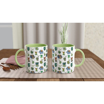 A white ceramic mug featuring a repeating pattern of Korok characters from The Legend of Zelda: Breath of the Wild and Tears of the Kingdom.