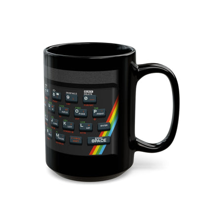 A black mug features pixel art graphics resembling a Retro Spectrum keyboard layout.