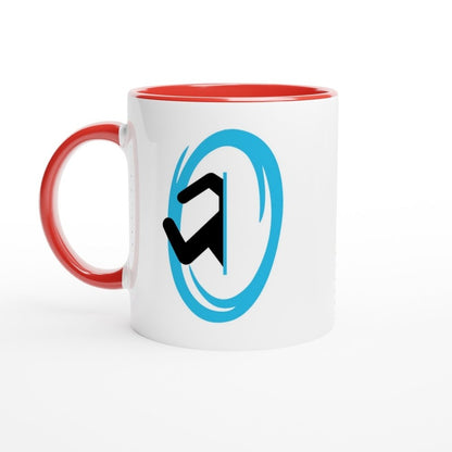 A white ceramic mug with a red handle and interior features a blue Portal design referencing the Half-Life video game.
