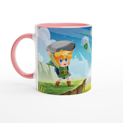 A pink mug depicts a chibi Link from Zelda struggling to lift a large rock while a Korok flies nearby.