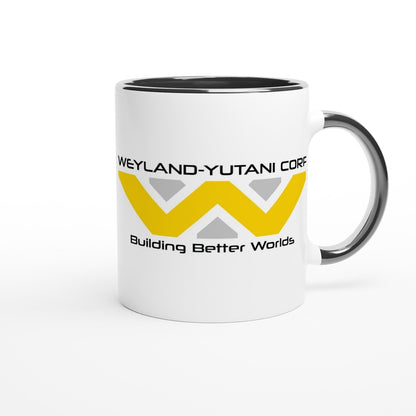 A white mug displays the Weyland-Yutani Corporation logo in yellow and black lettering that reads "Weyland-Yutani Corp" and "Building Better Worlds.