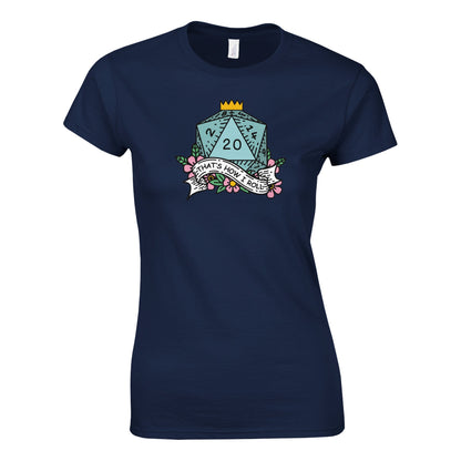 A dark blue fitted t-shirt displays a D20 die graphic surrounded by flowers and a banner reading "That's How I Roll" referencing the D&D game.