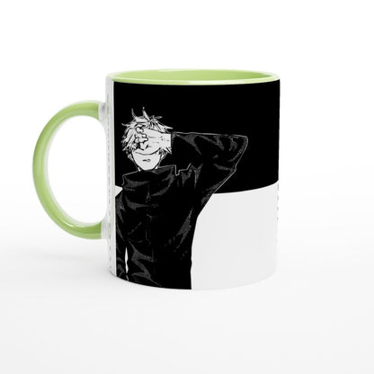 A white ceramic mug features a black and white illustration of Satoru Gojo from Jujutsu Kaisen, set against a yin/yang design.