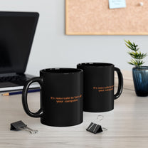 Two black mugs on a desk featuring the Windows 95/98 text It's now safe to turn off your computer.