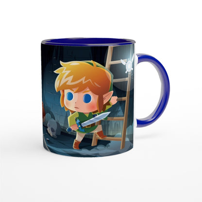 A blue mug depicts a chibi Link from The Legend of Zelda: Breath of the Wild and Tears of the Kingdom standing in a dungeon with a fairy.