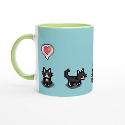 A ceramic mug features pixelated graphics of tuxedo cats and a heart emote inspired by the Stardew Valley computer game.