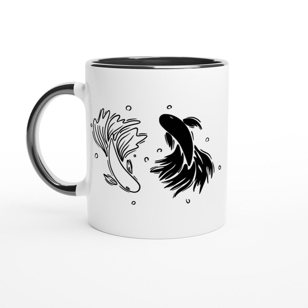 A white mug with a black rim and handle features a black and white illustration of betta fish arranged in a yin yang design.