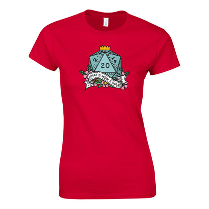 A red fitted t-shirt displays a D20 die graphic surrounded by floral elements and a banner reading "That's How I Roll," referencing the Dungeons & Dragons game.