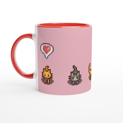 A white mug with a red interior and handle features pixelated graphics of Ginger and Tabby cats and an emote heart from the Stardew Valley video game.
