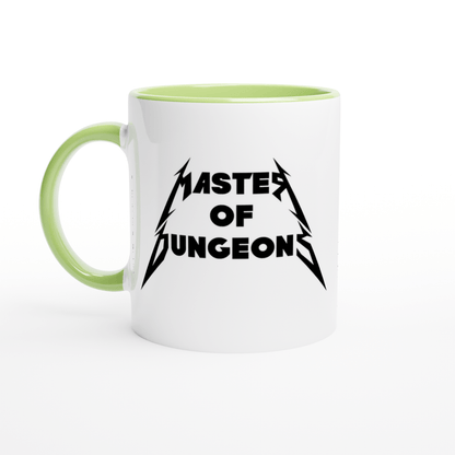 A white mug with a green handle and rim features "Master of Dungeons" printed in a font inspired by Metallica.