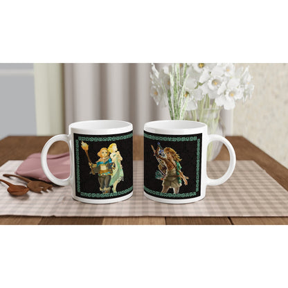 Two white mugs display an illustration of Link from The Legend of Zelda: Tears of the Kingdom, featuring Sheikah-inspired patterns and imagery.