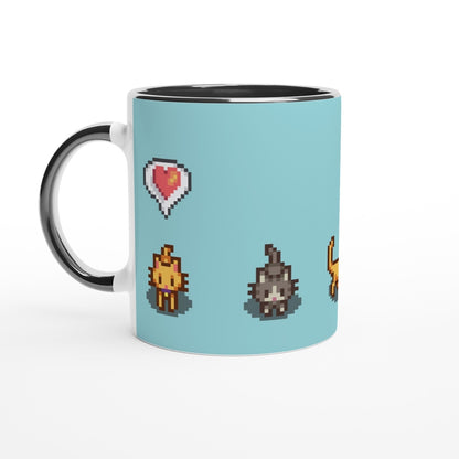 A white mug displays pixel art graphics from Stardew Valley featuring ginger and tabby cats alongside heart and emote icons.