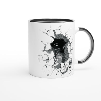 A white ceramic mug depicts a black and gray illustration of the Colossal Titan from Attack on Titan breaking through a wall.