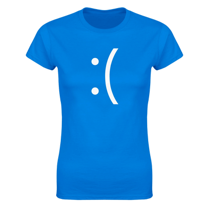 A blue ladies fit tee displays a white sad face emoticon referencing the Blue Screen of Death error message.