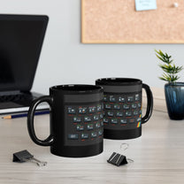 Two black mugs display pixel art graphics resembling a Retro Spectrum keyboard design with a rainbow stripe along the bottom edge.