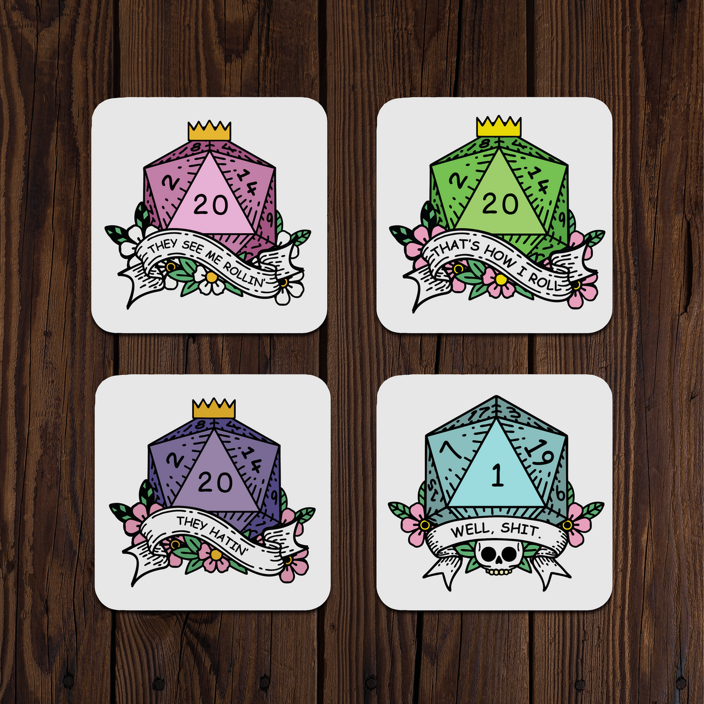 Four dice-themed coasters with colorful designs on a wooden surface